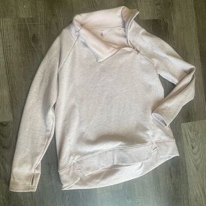 L pullover, zip detail and thumb hole